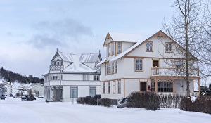 Akureyri during winter. Old town with traditional and historic buildings Akureyri during winter. Old town with traditional and historic buildings