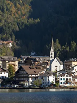 Alleghe at Lago di Alleghe under the peak of Civetta, an icon of the dolomites in the Alleghe at Lago di Alleghe under the peak of Civetta, an icon of the dolomites in the