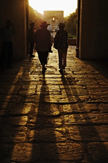American tourists silhouetted in entrance to Humayuns Tomb / Nizamuddin, India American tourists silhouetted in entrance to Humayuns Tomb / Nizamuddin, India