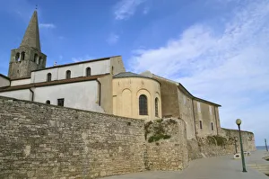 Ancient city wall and walled historical buildings by Adriatic Sea, Porec, Istria, Croatia Ancient city wall and walled historical buildings by Adriatic Sea, Porec, Istria, Croatia