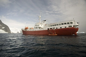 Antarctica. Expedition ship and zodiac off Pleneau Island Antarctica. Expedition ship and zodiac off Pleneau Island