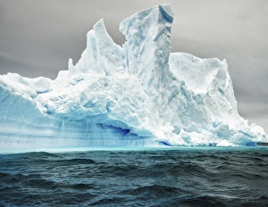 <b class=qtipBold><figcaption>Antarctica, large iceberg, blue ice</figcaption></b><br><em>© George Theodore / DanitaDelimont.com</em> Antarctica, large iceberg, blue ice