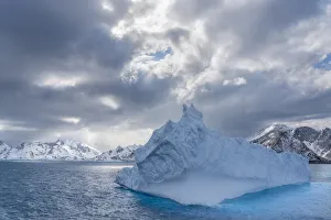 Antarctica, South Georgia Island. Landscape with iceberg and mountains Antarctica, South Georgia Island. Landscape with iceberg and mountains