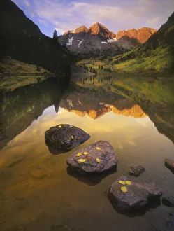 Aspen leaves signify the end of Fall and the beginning of winter at the maroon bells near Aspen leaves signify the end of Fall and the beginning of winter at the maroon bells near