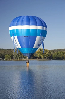 Australia, ACT, Canberra, Hot-Air Balloon, Touching Down on Lake Burley Griffin Australia, ACT, Canberra, Hot-Air Balloon, Touching Down on Lake Burley Griffin