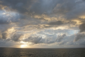 Australia, Queensland, Port Douglas. Sunrise over the Coral Sea Australia, Queensland, Port Douglas. Sunrise over the Coral Sea