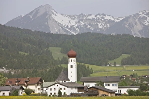 AUSTRIA, Lechtaler Alps, Heiterwang. Village view with Austrian Alps, springtime AUSTRIA, Lechtaler Alps, Heiterwang. Village view with Austrian Alps, springtime