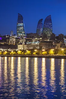 Azerbaijan, Baku. Bulvar Promenade, city skyline with Flame Towers Azerbaijan, Baku. Bulvar Promenade, city skyline with Flame Towers