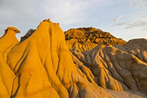 Badlands at first light in Theodore Roosevelt National Park, North Dakota, USA Badlands at first light in Theodore Roosevelt National Park, North Dakota, USA