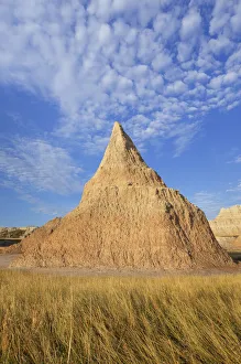Badlands formations and mixed grass prairie grasses. Badlands National Park, South Dakota Badlands formations and mixed grass prairie grasses. Badlands National Park, South Dakota