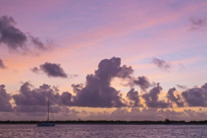 Bahamas, Exuma Island. Sailboat anchored at sunset Bahamas, Exuma Island. Sailboat anchored at sunset