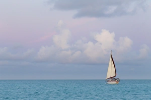 Bahamas, Exuma Island. Sailboat at sunset. Credit as: Don Paulson / Jaynes Gallery / DanitaDelimont Bahamas, Exuma Island. Sailboat at sunset. Credit as: Don Paulson / Jaynes Gallery / DanitaDelimont