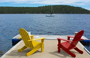 Bar Harbor Maine Life in Maine peaceful scene on water with Adirondack chairs to relax Bar Harbor Maine Life in Maine peaceful scene on water with Adirondack chairs to relax