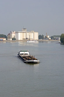 Barge on the Rhine River between France and Germany near Frieberg, Germany Barge on the Rhine River between France and Germany near Frieberg, Germany