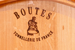 A barrel - Bouttes - Tonnellerie de France. The barrel maker cooper has burnt his A barrel - Bouttes - Tonnellerie de France. The barrel maker cooper has burnt his