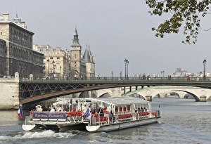 A bateaux cruises on the Seine river, Paris, France A bateaux cruises on the Seine river, Paris, France