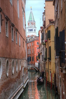 Belltower St. Marks Square seen through narrow canal, Venice Italy Belltower St. Marks Square seen through narrow canal, Venice Italy