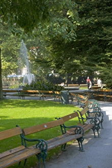 Empty benches in the Rathauspark (Vienna City Hall Park), Vienna, Austria Empty benches in the Rathauspark (Vienna City Hall Park), Vienna, Austria
