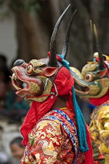 Bhutan, Punakha Dzong. Punakha Drubchen Festival, masked dancers Bhutan, Punakha Dzong. Punakha Drubchen Festival, masked dancers