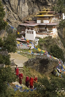 Bhutanese monks at a Taksang Monastery near Paro, Bhutan Bhutanese monks at a Taksang Monastery near Paro, Bhutan