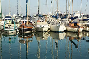 Boats and reflections in the marina area of Beaulieu sur Mer. on the coastline in Boats and reflections in the marina area of Beaulieu sur Mer. on the coastline in