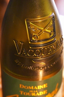 A bottle of Vacqueyras, detail of the glass moulding. Domaine la Tourade, Andre Andre Richard A bottle of Vacqueyras, detail of the glass moulding. Domaine la Tourade, Andre Andre Richard