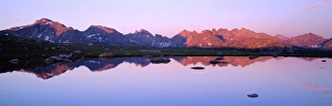 BRIDGER WILDERNESS, WYOMING. USA. Peaks of the Continental Divide reflected in tarn at BRIDGER WILDERNESS, WYOMING. USA. Peaks of the Continental Divide reflected in tarn at