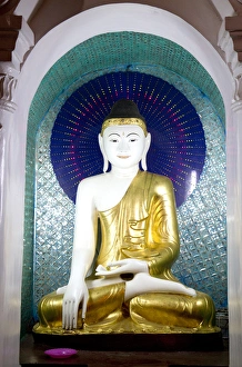 Buddha statue at the Shwedagon Paya located in (Rangoon)Yangon, (Burma) Myanmar Buddha statue at the Shwedagon Paya located in (Rangoon)Yangon, (Burma) Myanmar