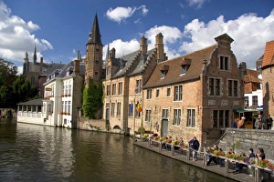 Buildings along a canal at the city of Bruges in the province of West Flanders, Belgium Buildings along a canal at the city of Bruges in the province of West Flanders, Belgium