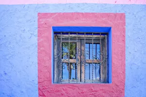 Cabo San Lucas, Mexico. Colorful wall and window