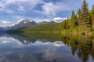 Calm reflection on Bowman Lake in Glacier National Park, Montana, USA Calm reflection on Bowman Lake in Glacier National Park, Montana, USA