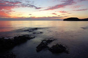 Canada, British Columbia, Cabbage Island, Colorful sunset overlooking the Straight Canada, British Columbia, Cabbage Island, Colorful sunset overlooking the Straight