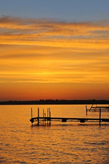 Canada, Manitoba, Clearwater Lake Provincial Park. Docks on Clearwater Lake at sunrise Canada, Manitoba, Clearwater Lake Provincial Park. Docks on Clearwater Lake at sunrise
