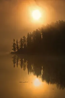 Canada, Ontario, Kenora. Isabel Lake in fog at sunrise. Credit as Canada, Ontario, Kenora. Isabel Lake in fog at sunrise. Credit as