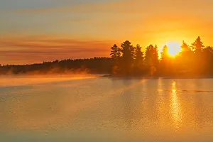 Canada, Ontario, Sunrise on Kakabikitchewan Lake. Credit as Canada, Ontario, Sunrise on Kakabikitchewan Lake. Credit as