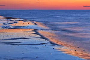 Canada, Prince Edward Island, Cable Head. Shoreline along Gulf of St. Lawrence at sunset Canada, Prince Edward Island, Cable Head. Shoreline along Gulf of St. Lawrence at sunset