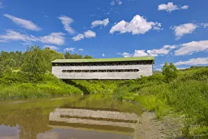Canada, Quebec, St-Bruno-de-Guigues. Covered bridge over river Canada, Quebec, St-Bruno-de-Guigues. Covered bridge over river