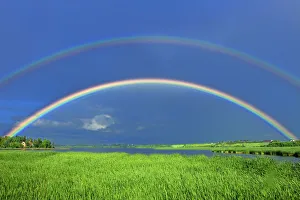 Canada, Quebec, St. Gedeon. Double rainbow after storm Canada, Quebec, St. Gedeon. Double rainbow after storm