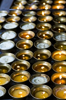Candles burning in the Chimi Lhakhang moastery, Bhutan Candles burning in the Chimi Lhakhang moastery, Bhutan