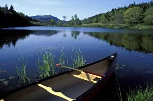 Images Dated 30th December 2003: A canoe rests on the shore of Little Long Pond at Acadia National Park, Maine
