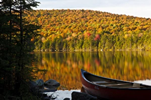 A canoe on the shoreline of Pond of Safety in the Randolph Community Forest A canoe on the shoreline of Pond of Safety in the Randolph Community Forest