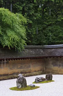 Images Dated 21st June 2012: The carefully placed rocks and raked gravel gardens of the Zen garden of Ryoan-Ji Temple in Kyoto