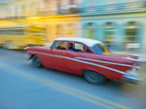 Caribbean, Cuba, Havana, Havana Vieja, UNESCO World Heritage Site, classic car in motion