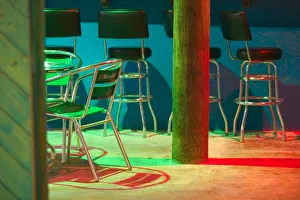 <b class=qtipBold><figcaption>Caribbean, TURKS</figcaption></b><br>Caribbean, TURKS & CAICOS, Grand Turk Island, Cockburn Town: Water's Edge Cafe, Cafe Chairs<br><em>© Walter Bibikow / DanitaDelimont.com</em> Caribbean, TURKS