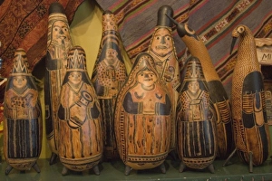 Carved gourds and other folk art on display in shop., Peru, Lima Carved gourds and other folk art on display in shop., Peru, Lima