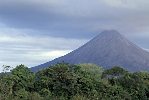 Central America, Costa Rica, Arenal Volcano. Rainforest beneath Arenal (erupting Central America, Costa Rica, Arenal Volcano. Rainforest beneath Arenal (erupting