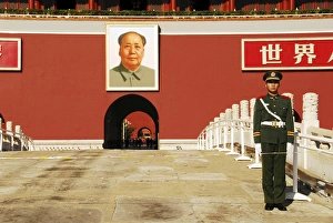 China. Beijing, security guard posted on the Tiananmen Gate of the Forbidden City in China. Beijing, security guard posted on the Tiananmen Gate of the Forbidden City in