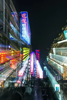 China, Shanghai. Nanjing Road, neon sign blur China, Shanghai. Nanjing Road, neon sign blur