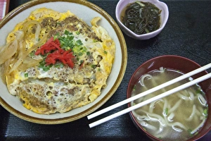 Classic pork over rice bowl with noodle soup served in Japan Classic pork over rice bowl with noodle soup served in Japan