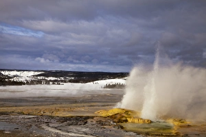 Clepsydra geyser erupts in the Loower Geyser Basin in Yellowstone National Park, Wyoming Clepsydra geyser erupts in the Loower Geyser Basin in Yellowstone National Park, Wyoming